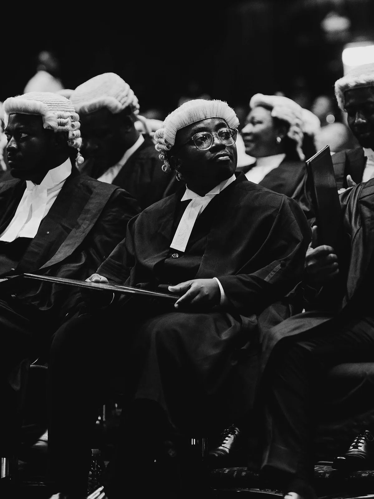 Why do lawyers wear wigs, and why do some Africans want them gone?