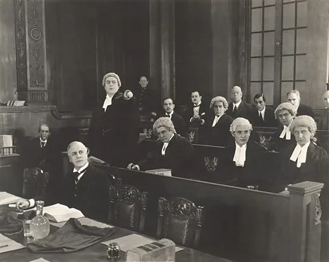 Why do lawyers wear wigs, and why do some Africans want them gone?